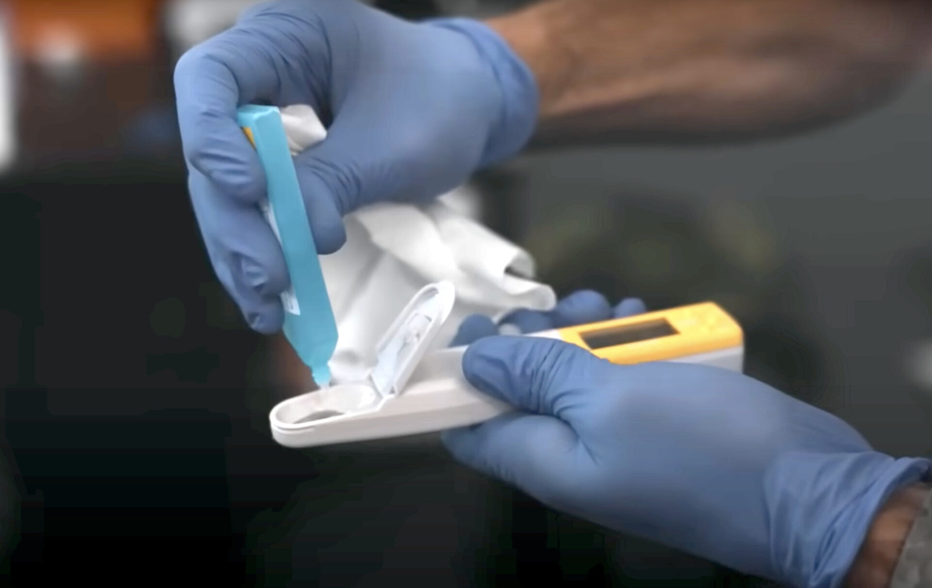 Physiologist Jared Berg tests a sweat sample during a metabolic test.